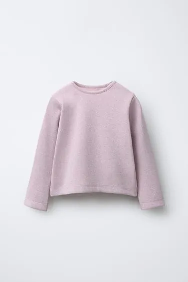 Блестящая футболка в рубчик- Заказать в России