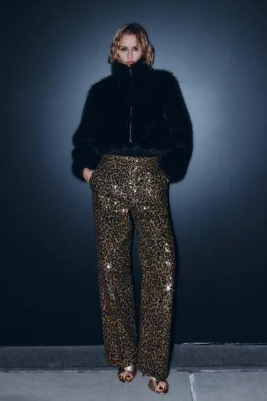 Брюки прямого кроя с пайетками и анималистическим принтом- Заказать в России