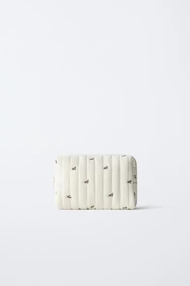 Косметичка с цветочным принтом- Заказать в России