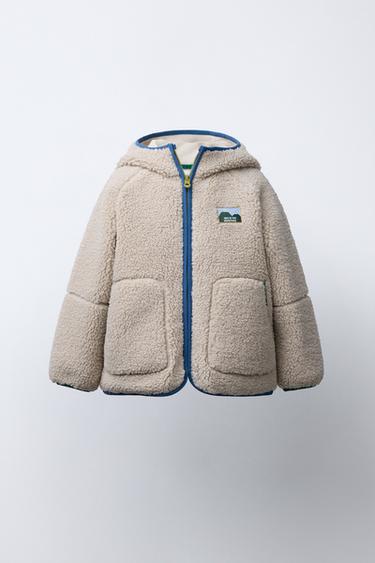 Zara Куртка из искусственного меха с контрастными отделками купить с доставкой.