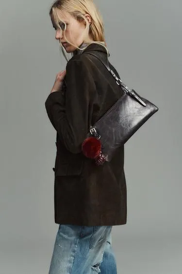 Сумка с заклепками