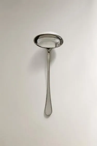 Блестящая стальная неваляшка