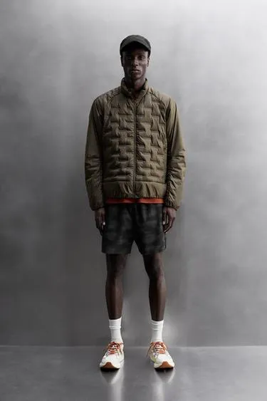 Стеганая куртка с наполнителем из пуха для бега