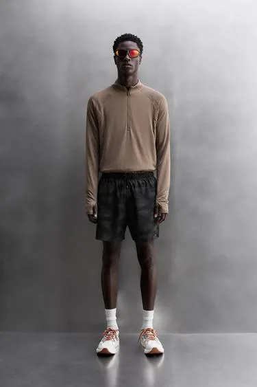 Перфорированные шорты для бега- Заказать в России