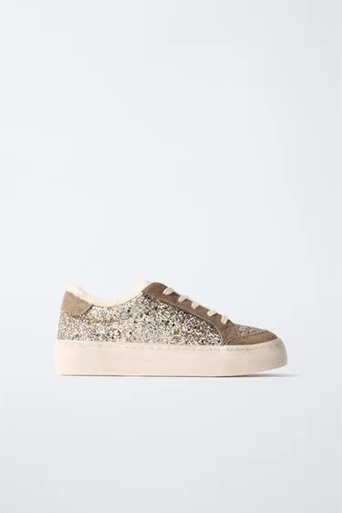 Кроссовки блестящие из искусственной овчины