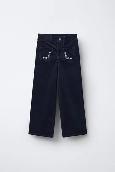 Бархатные брюки с вышивкой в виде цветов