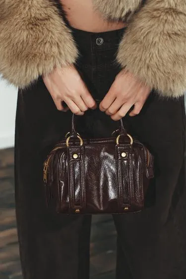 Сумка с металлическими деталями- Заказать в России