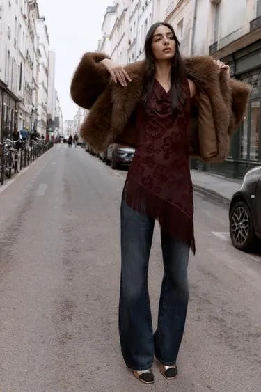 Топ асимметричного кроя с бахромой деворе- Заказать в России