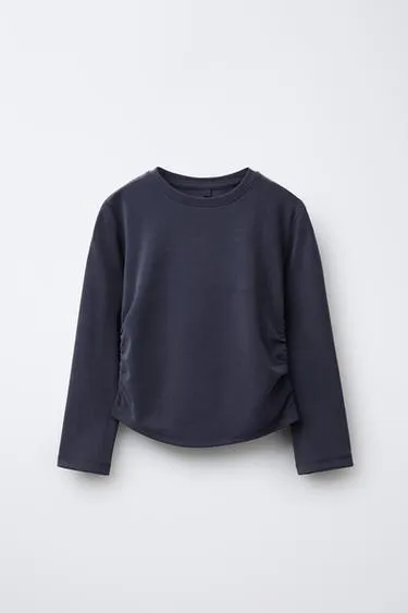 Спортивная футболка со сборками- Заказать в России