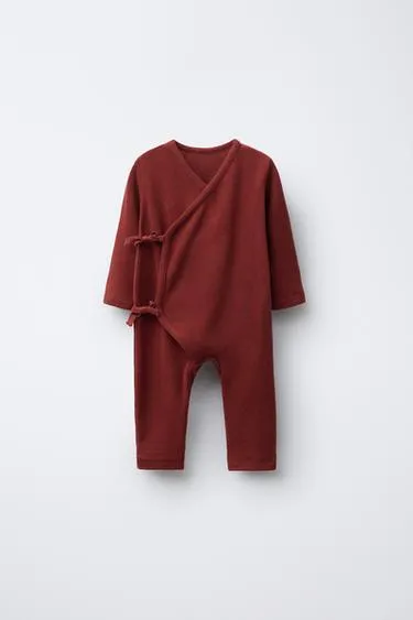 Комбинезон из мягкого материала с завязками- Заказать в России