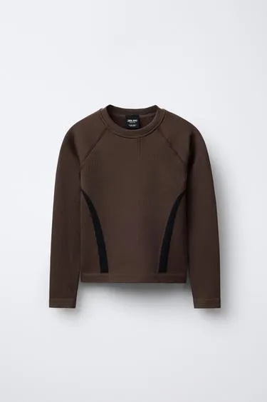 Бесшовный лонгслив с контрастными деталями из лыжной коллекции- Заказать в России