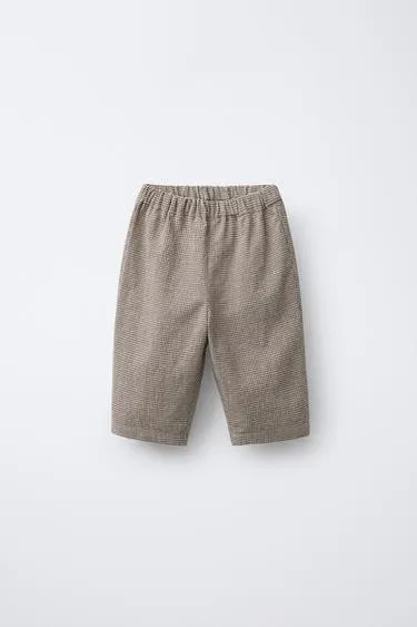 Брюки в клетку виши