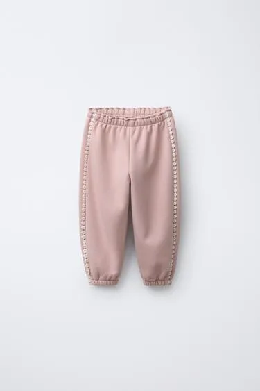 Брюки-джоггеры с цветочным кружевом- Заказать в России