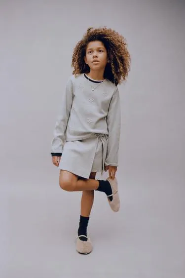 Лонгслив SOFT TOUCH с бантами и бусинами