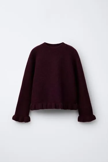 Вязаный джемпер с воланами