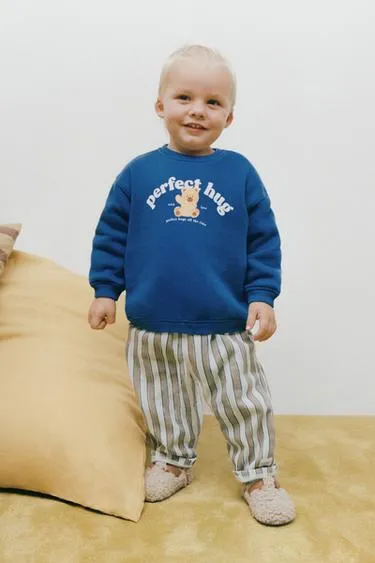 Брюки BAGGY в полоску с нашивкой- Заказать в России