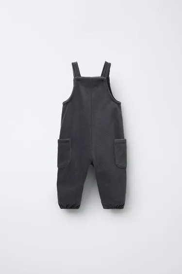 Вельветовый комбинезон с карманами