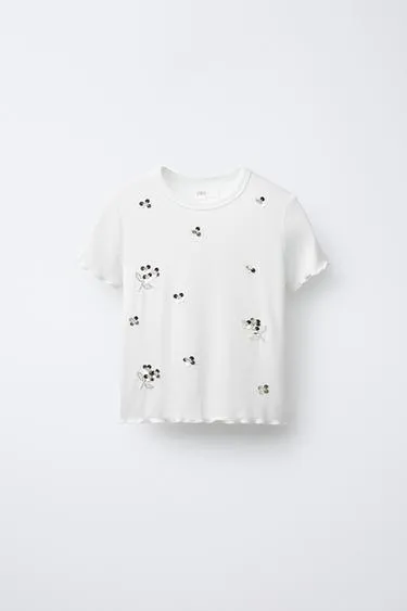 Футболка с пайетками и листьями