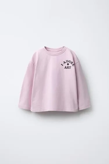 Лонгслив с блестящим принтом- Заказать в России