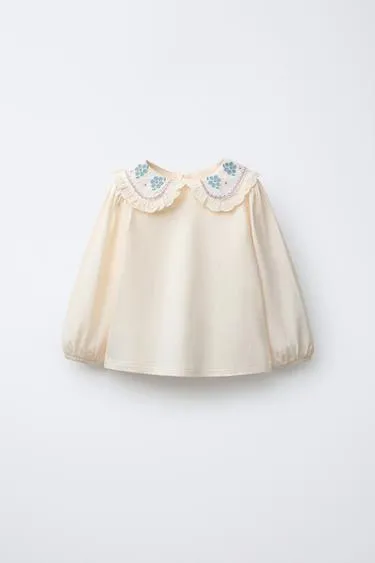 Футболка с вышивкой и отложным воротником- Заказать в России