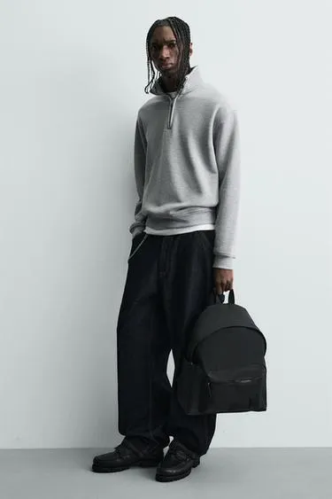 Прорезиненный рюкзак- Заказать в России