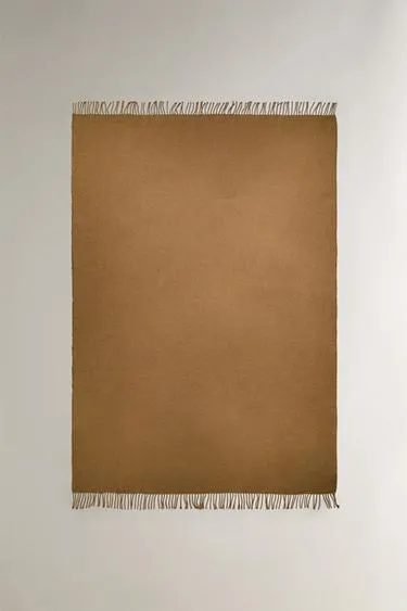 Декоративное покрывало с бахромой