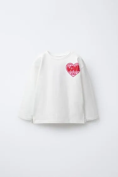 Лонгслив с рельефным принтом- Заказать в России