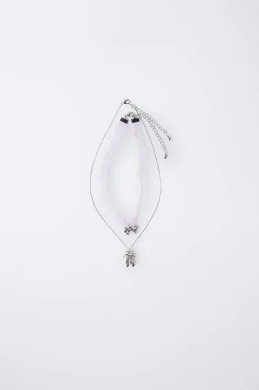 Набор из двух ожерелий «балет»- Заказать в России