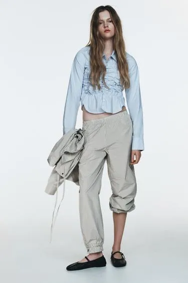 Нейлоновые брюки-бомбашки в клетку