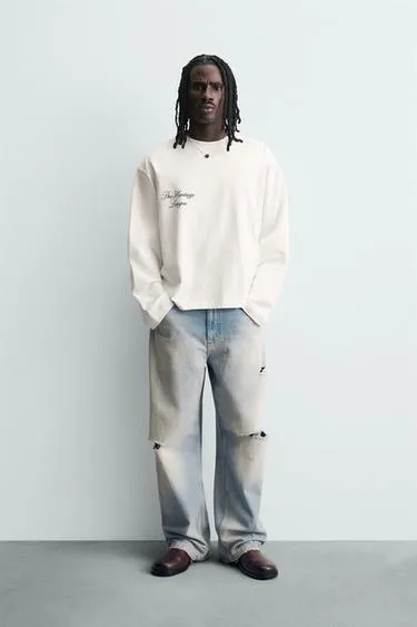 Футболка с принтами- Заказать в России