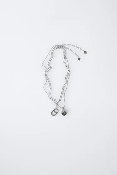 Набор из двух ожерелий с пластиной и кубиком- Заказать в России