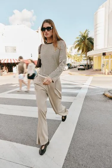 Брюки с широкими штанинами и двойным поясом- Заказать в России