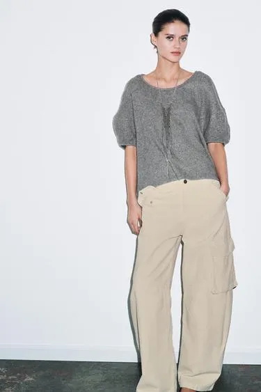 Свободный свитер из трикотажа- Заказать в России