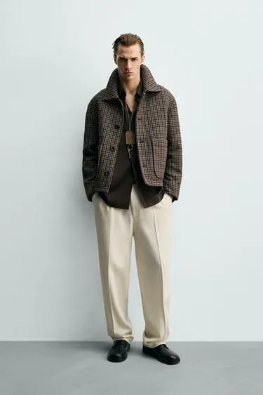 Куртка в клетку с карманами