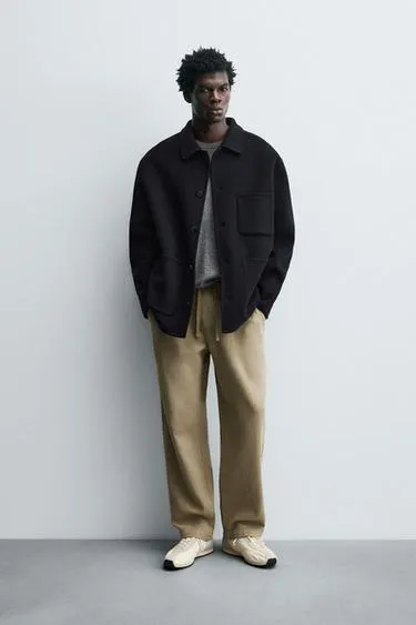 Текстурированные брюки свободного кроя- Заказать в России