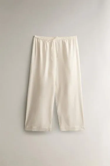 Брюки с кружевными вставками- Заказать в России