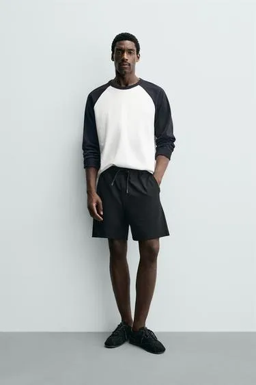 Комфортабельные текстурированные бермуды- Заказать в России