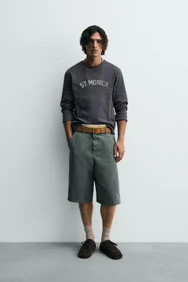 Футболка в рубчик с принтами и эффектом потертости- Заказать в России