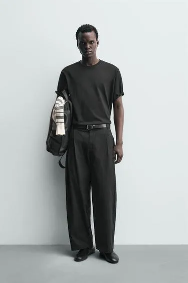 Широкие брюки с защипами