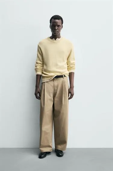 Широкие брюки с защипами