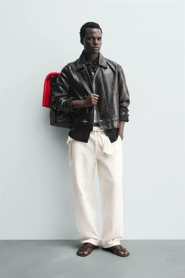 Куртка из искусственной кожи с навесными петлями