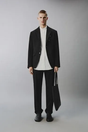 Костюмные брюки из 100% шерсти