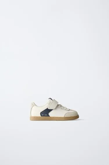 Кроссовки с контрастными деталями- Заказать в России