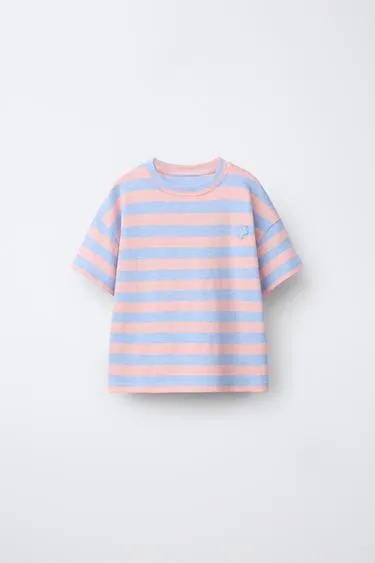 Футболка в полоску с цветочной нашивкой