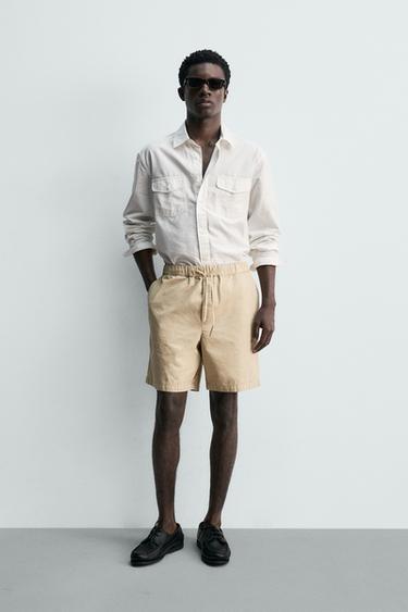 Zara Шорты стандартной посадки с эффектом потертости