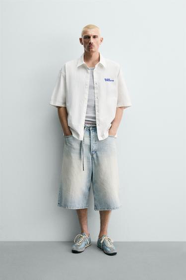 Zara Рубашка с эффектом потертости и принтом купить с доставкой.