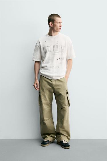 Zara Футболка с принтом и эффектом потертости