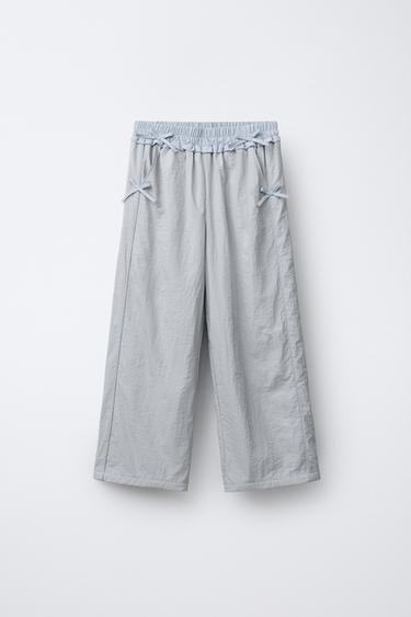 Zara Нейлоновые брюки с бантиками и флисовой подкладкой купить с доставкой.