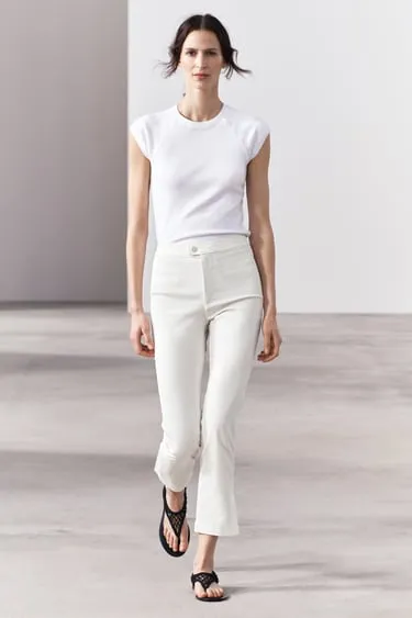 Футболка из хлопка с эффектом потертости- Заказать в России