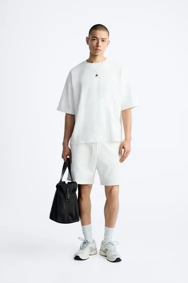 Футболка геометрического кроя- Заказать в России